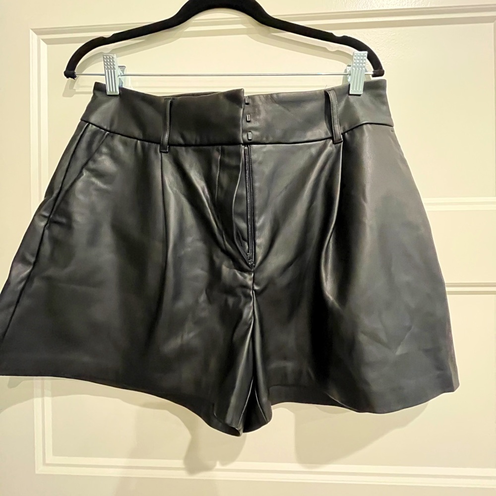 Womens Express faux leather dress shorts.